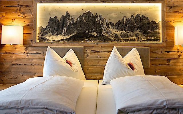 Die Zimmer im Hotel Chalet Dolomites sind ein erholsamer Rückzugsort